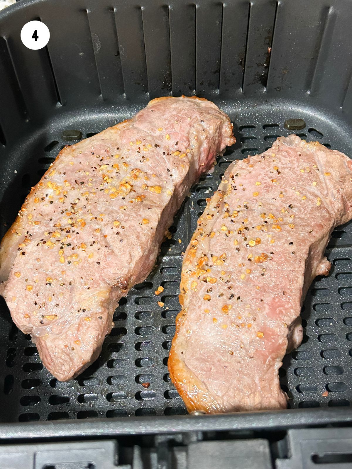 Steaks flipped halfway through cooking.