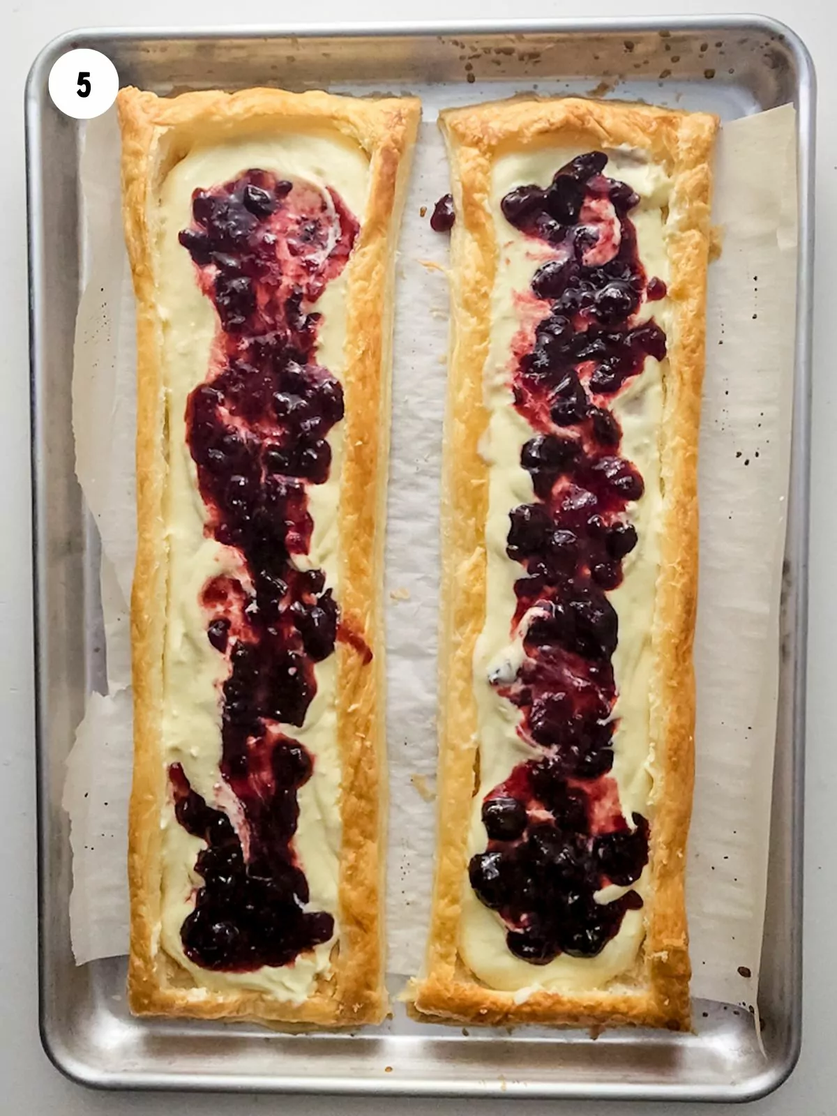 Blueberry jam added on top of the cream cheese layer.
