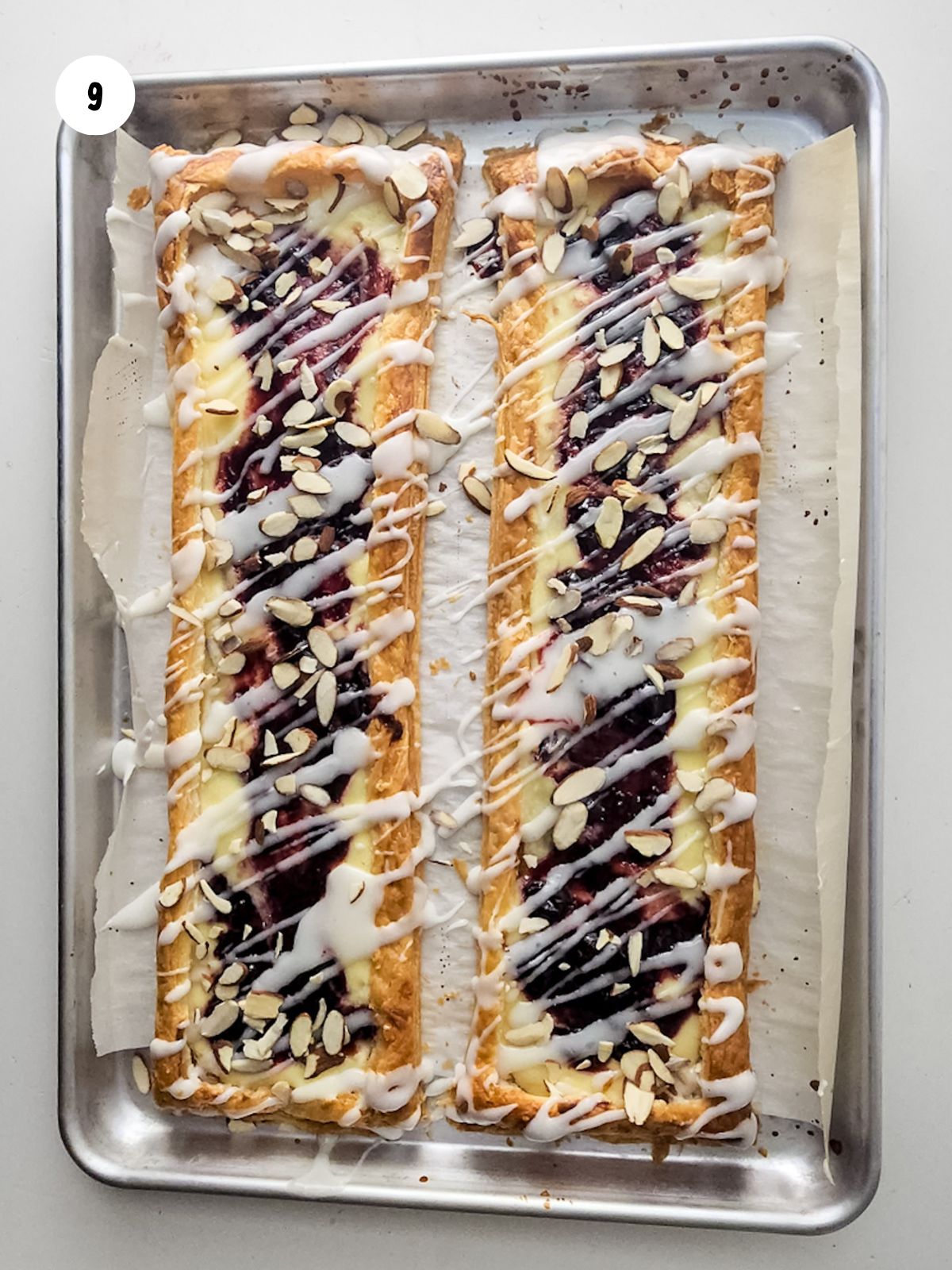 Sliced almonds sprinkled on top of the pastries.