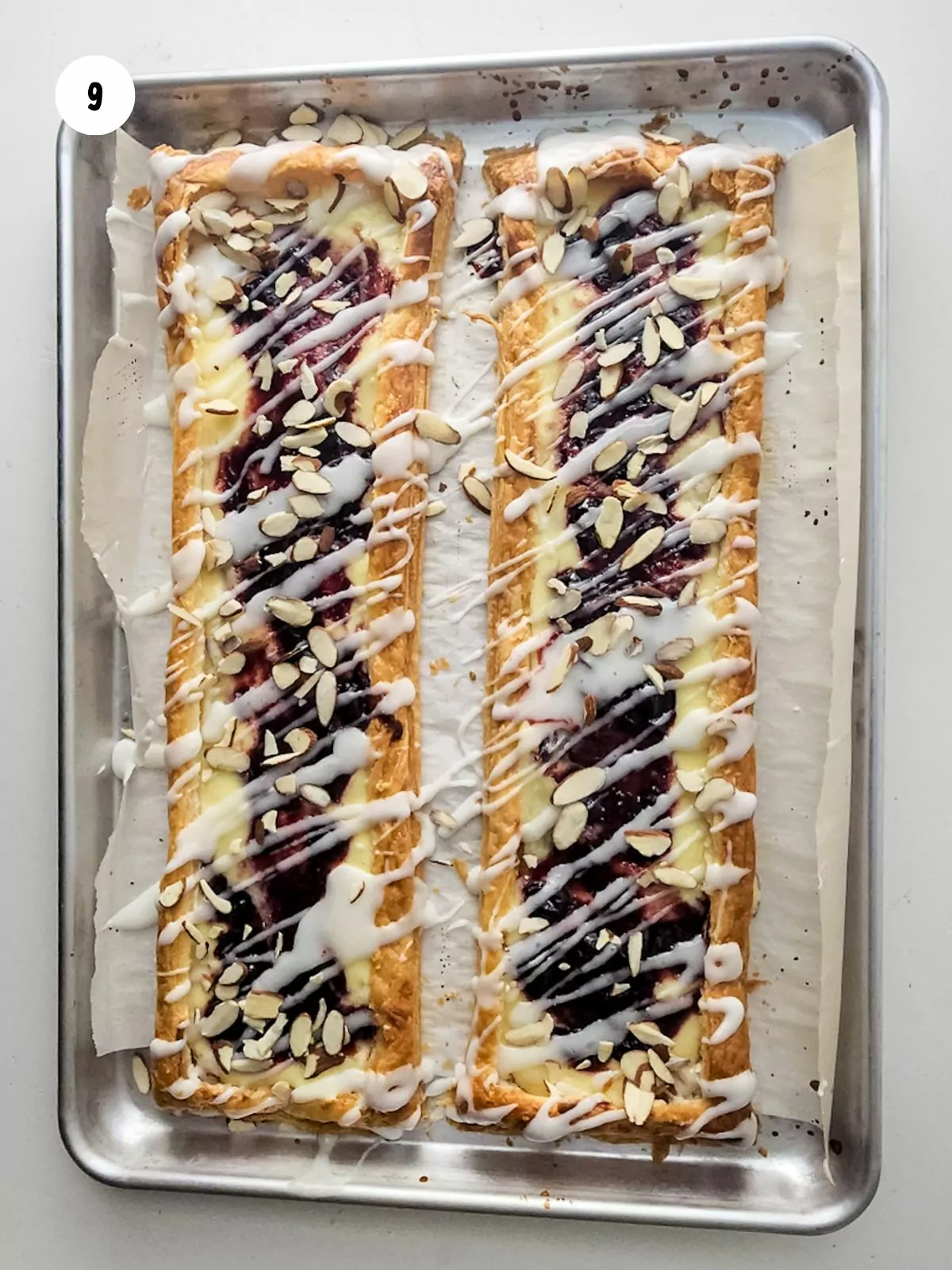 Sliced almonds sprinkled on top of the pastries.