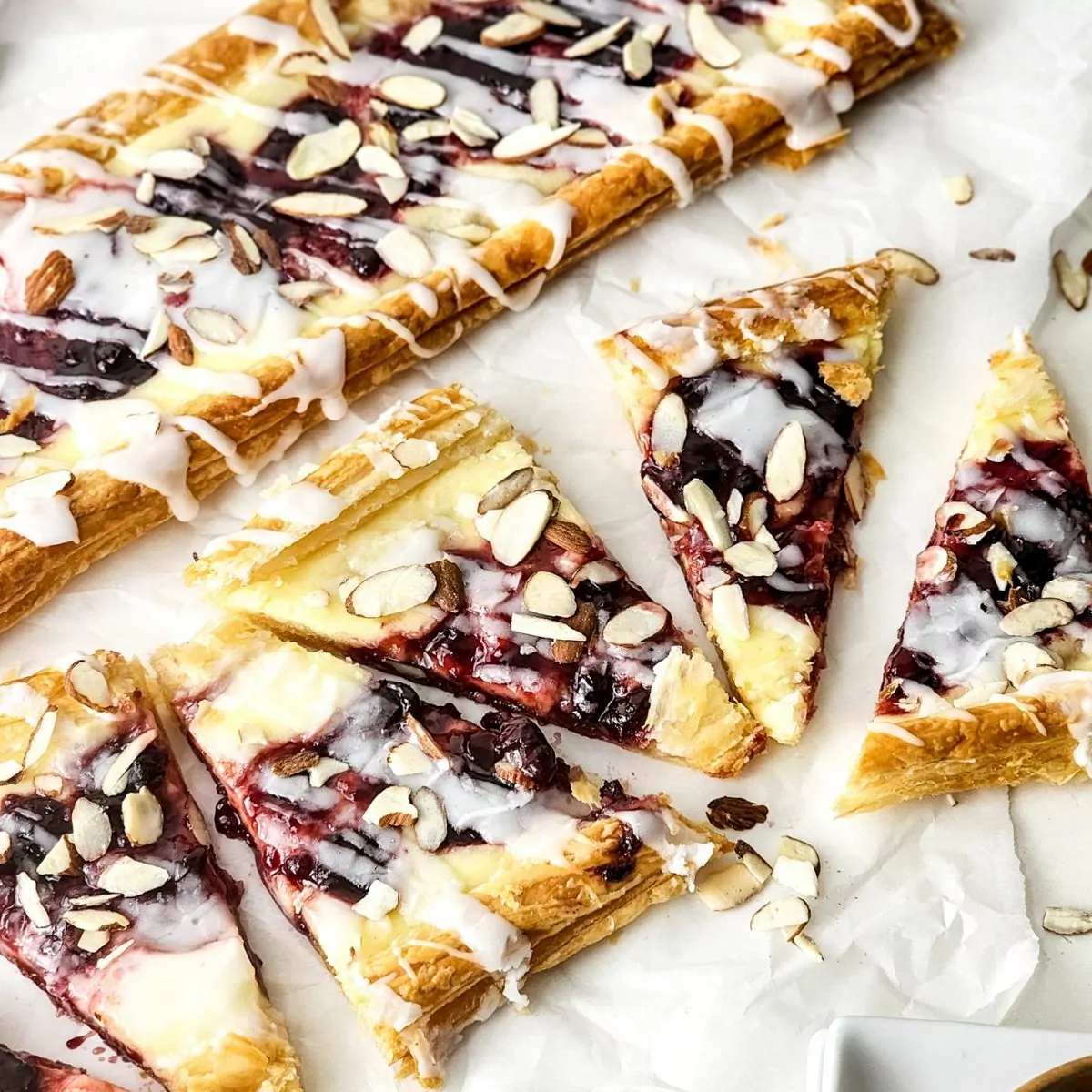 Blueberry Danish with Puff Pastry cut into triangles.