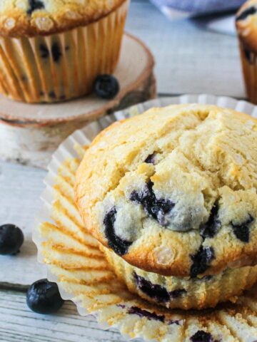 Blueberry Muffin with the wrapper pulled away.
