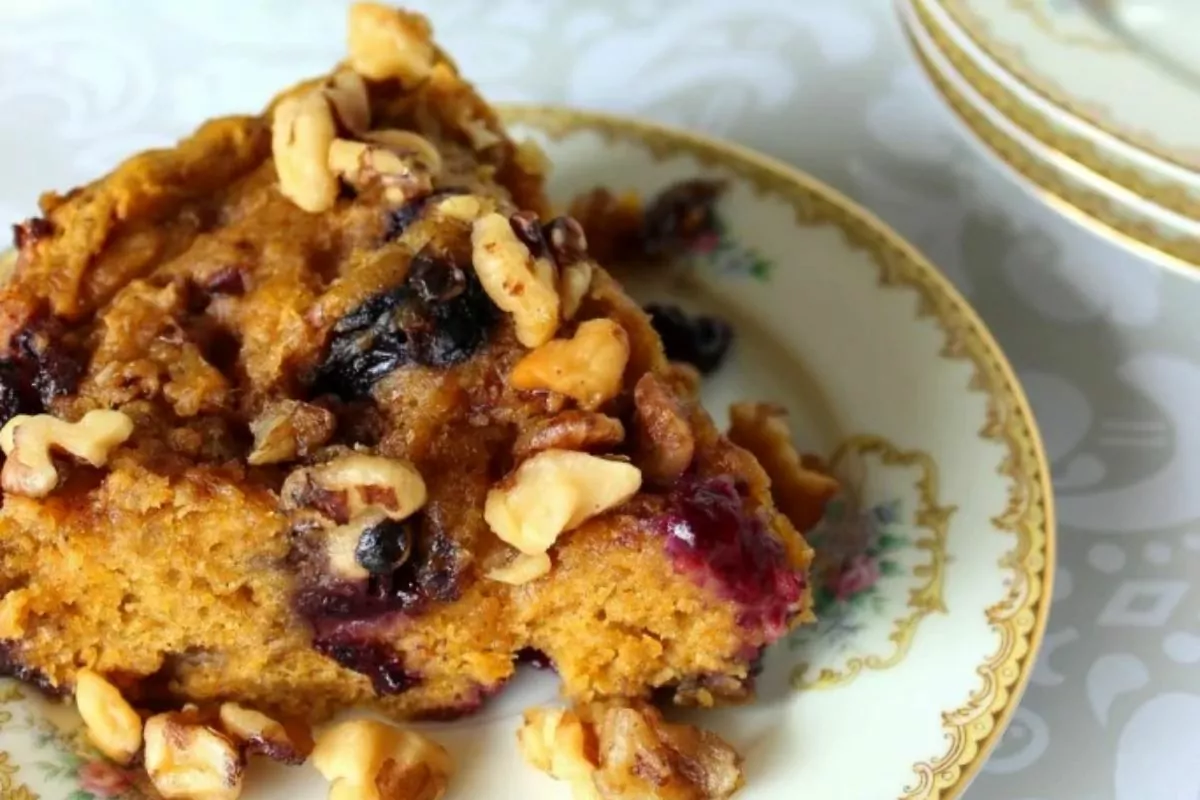 plate of Pumpkin Blueberry Cake with pecan toppings