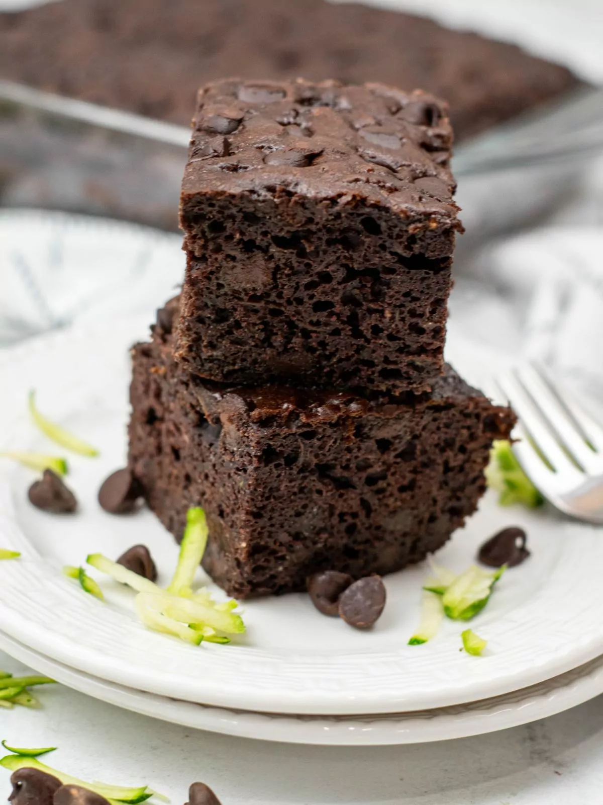 Two squares of chocolate zucchini cake.