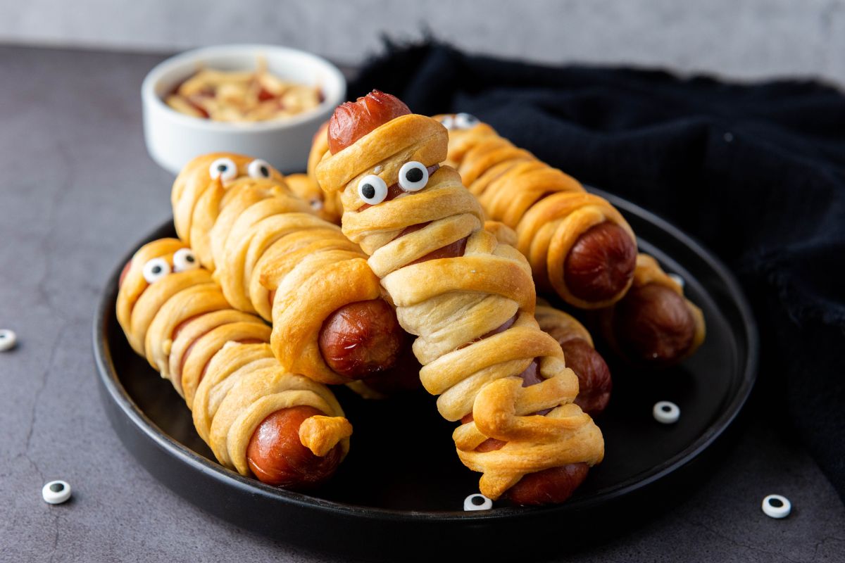 Mummy crescent roll wrapped hot dogs.