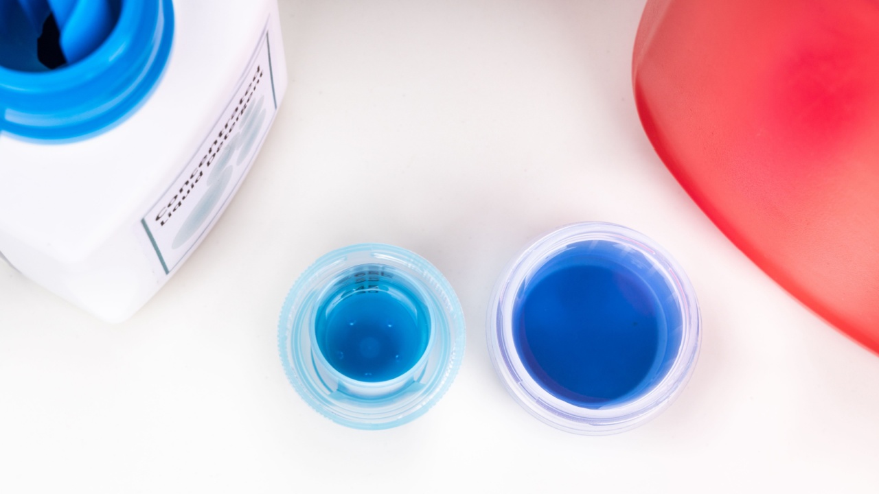 Close-up comparison of regular and concentrated laundry liquid detergent against white background