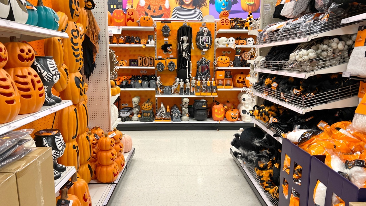 Department store aisle with Halloween decorations, packages prominently displayed