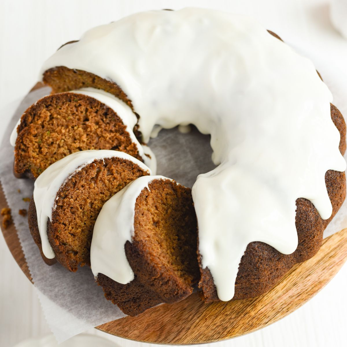 Zucchini Pumpkin Bread bundt cake with cream cheese frosting.