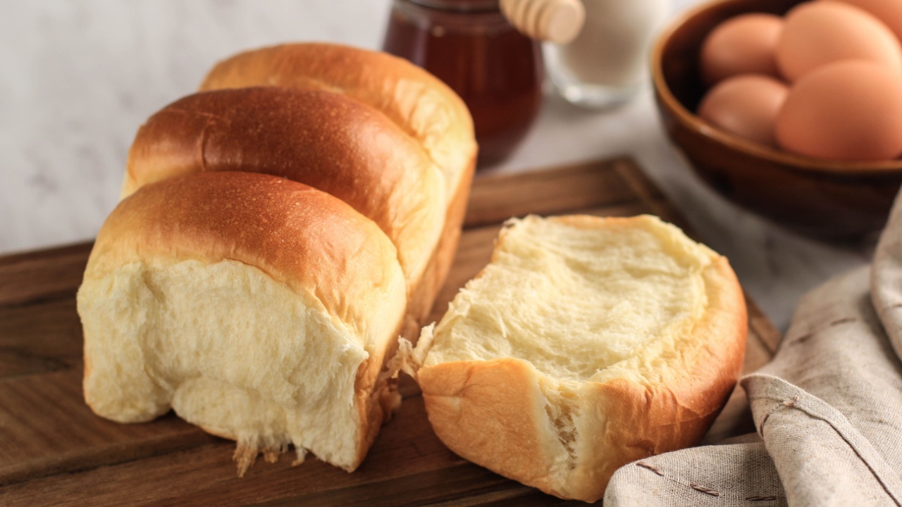 Fresh Baked Japanese Soft and Fluffy Bun White Bread, Popular as Hokaido Milk Bread . Homemade Japanese Brioche