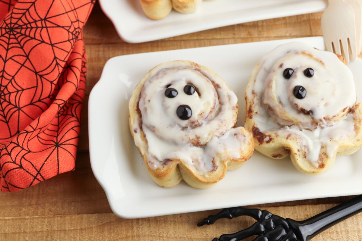 Platter with 2 ghost cinnamon rolls.