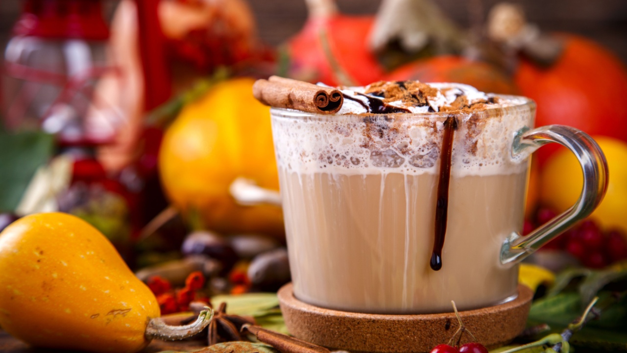 Pumpkin Smoothies,Spicy Drink is a cinnamon Dolce Latte,whipped cream and chocolate syrup.Autumn still-life.selective focus