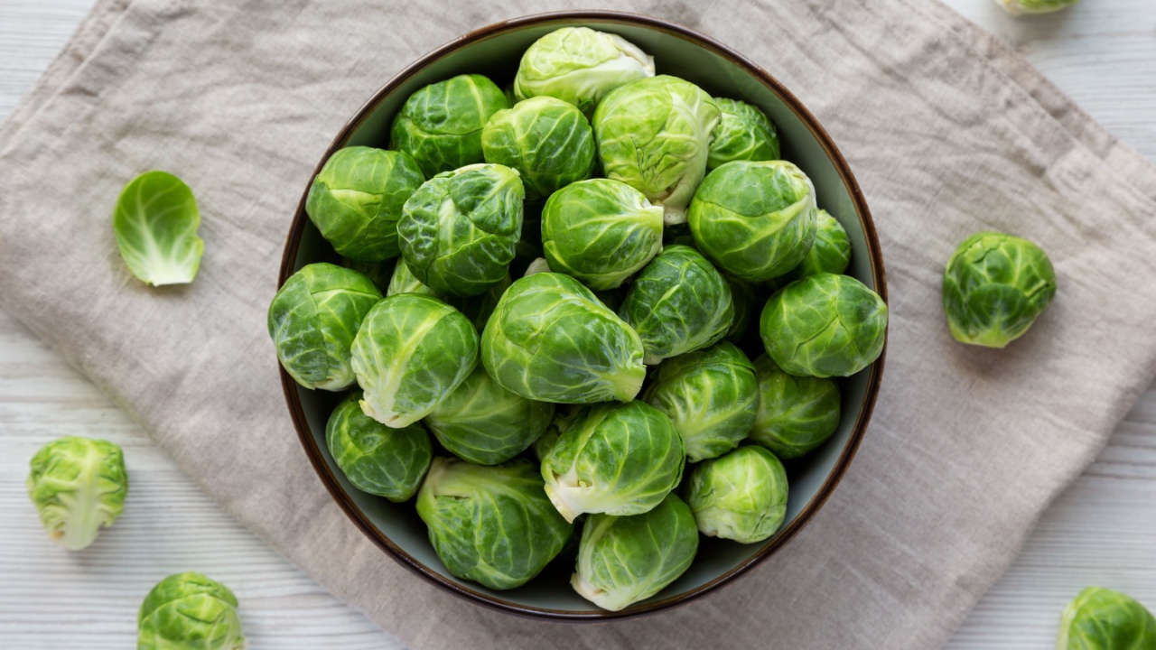 Raw Organic Brussel Sprouts in a Bowl, top view. Flat lay, overhead, from above.