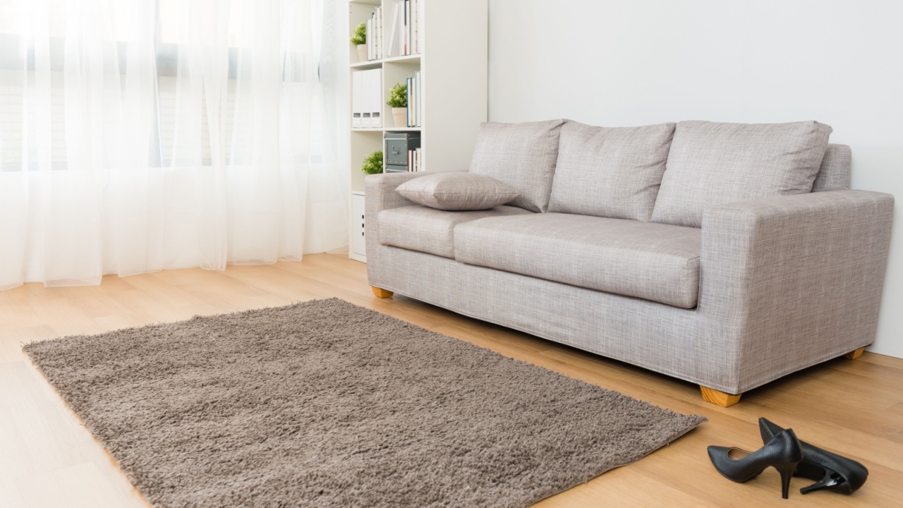 comfortable beautiful living room with business woman high heel shoes.