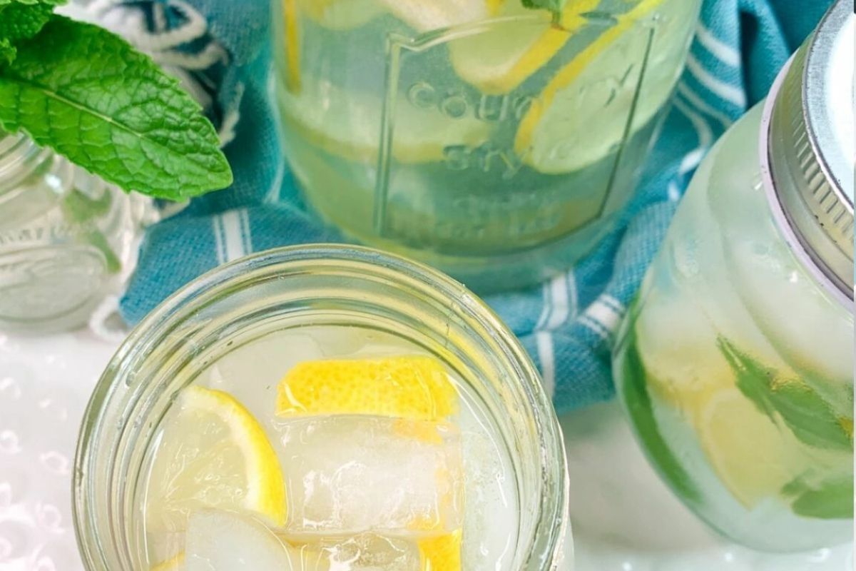 lemon sparkling water with fresh mint leaves.