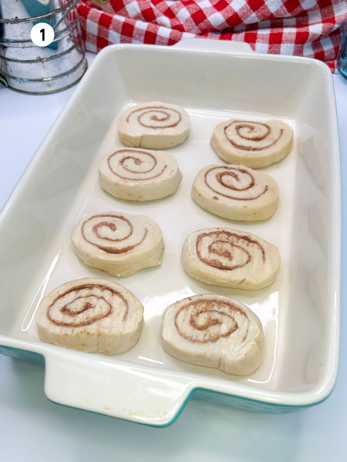 Add rolls to casserole dish.