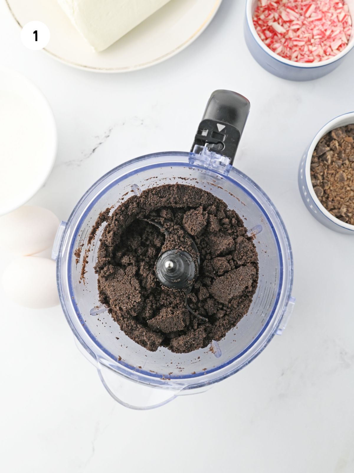 Crushed oreos in a food processor.