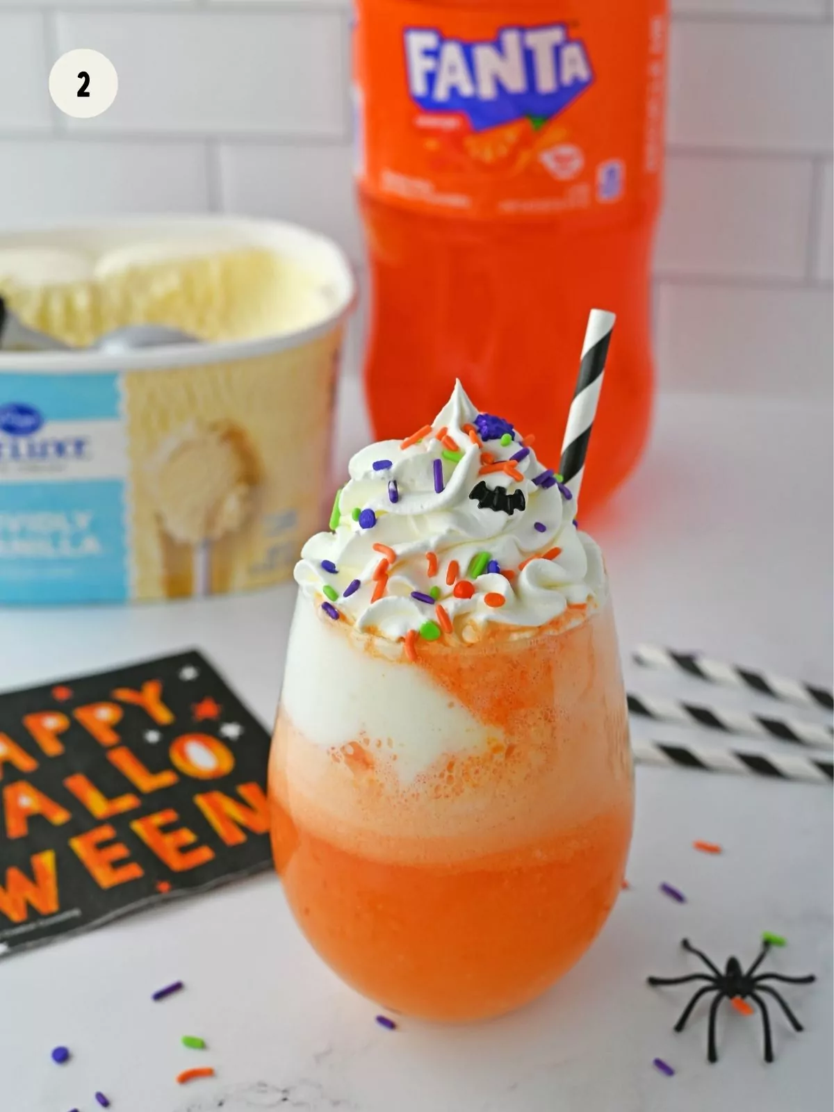 Add orange soda on the ice cream.