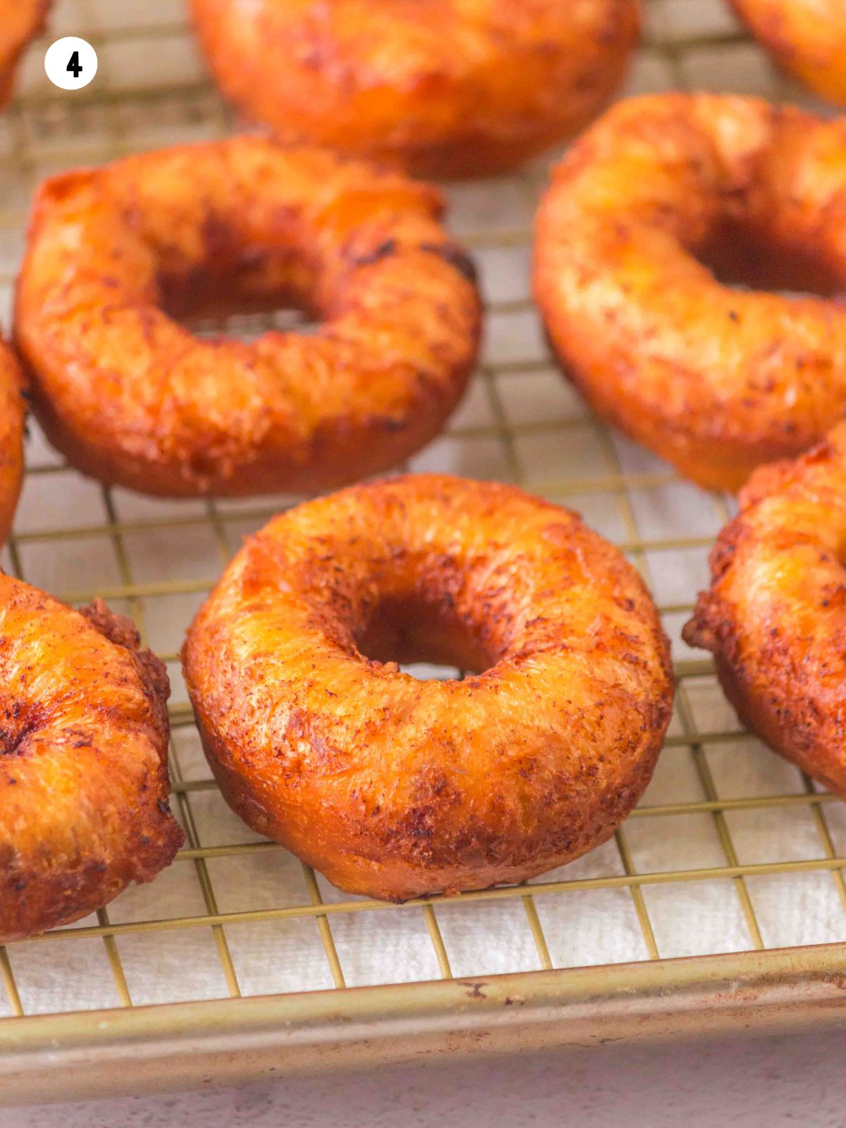 closeup of draining donuts.