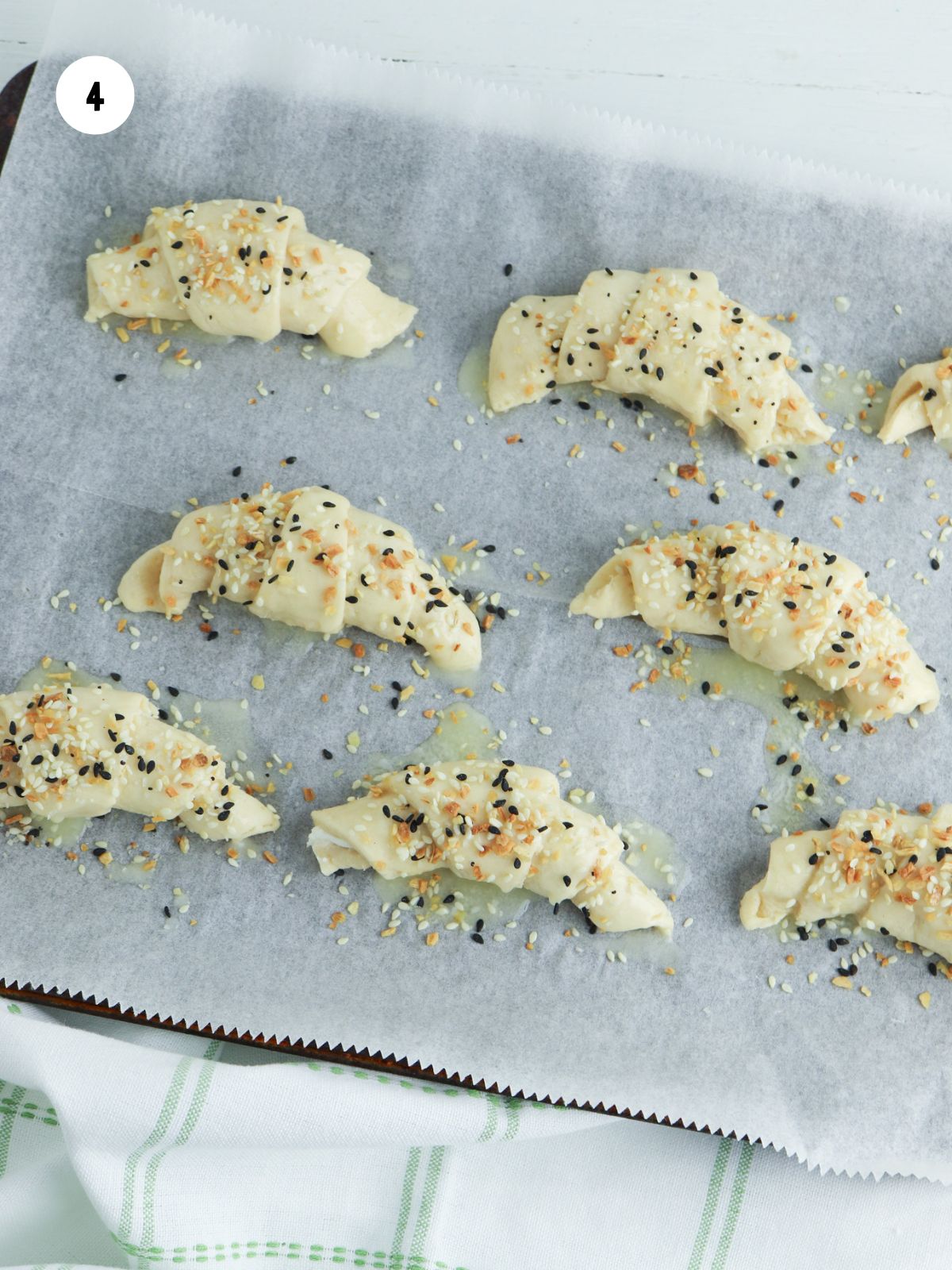 Buttered rolls with everything seasoning sprinkled on.