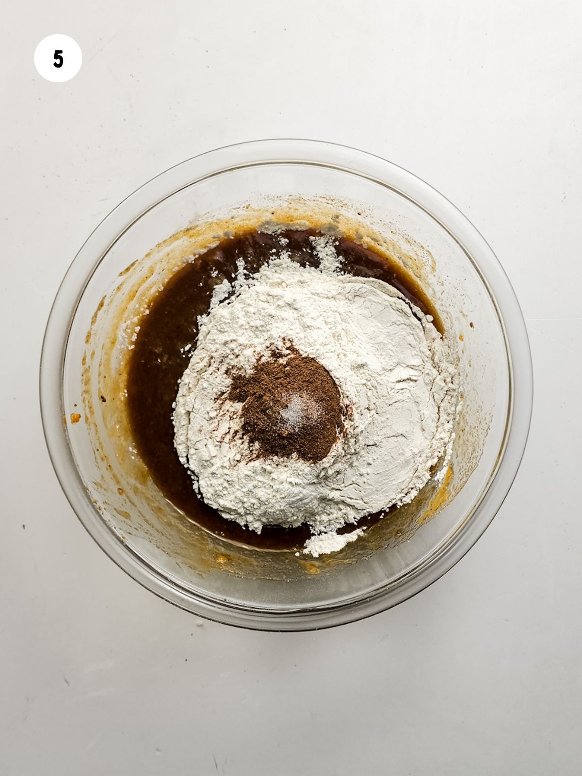 Flour and spices added to the pumpkin mixture.