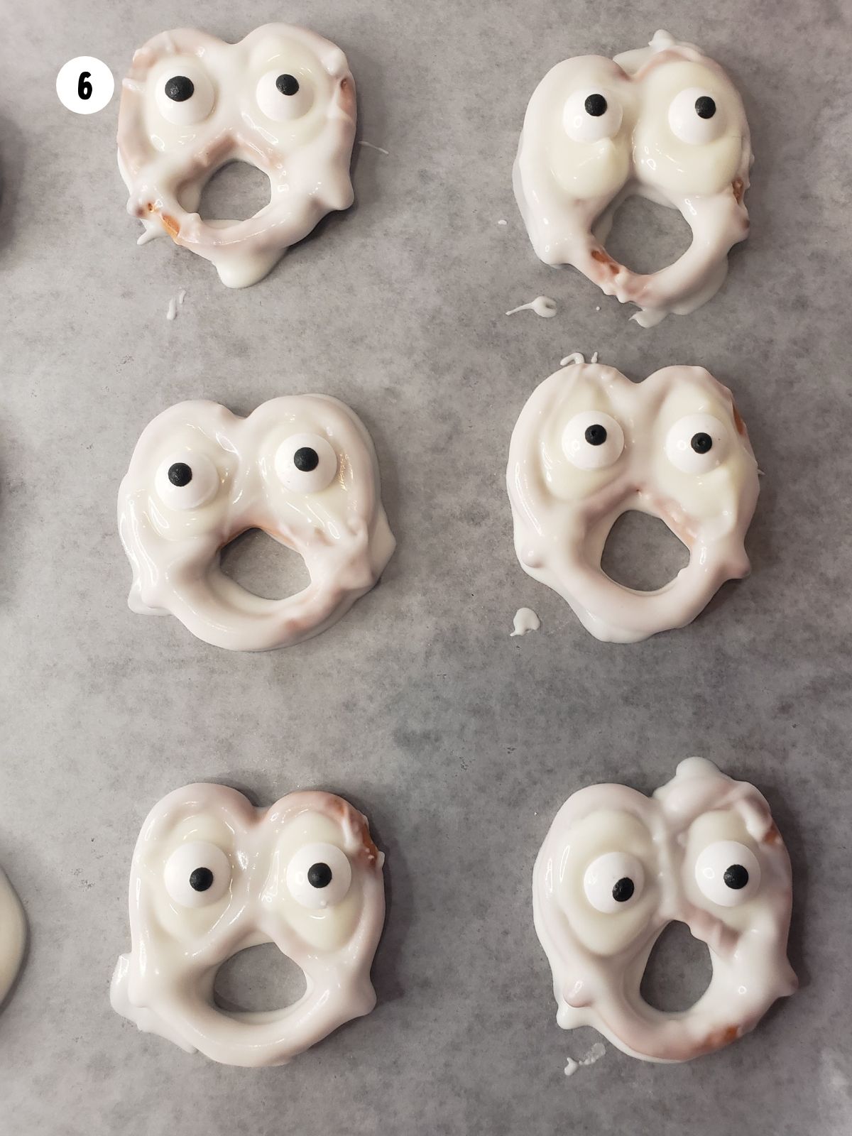 Edible eyeballs added to the top of the pretzels.