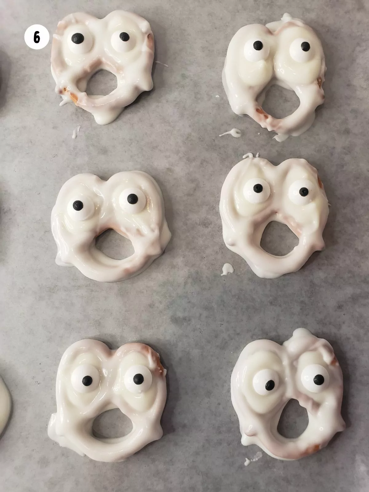Edible eyeballs added to the top of the pretzels.