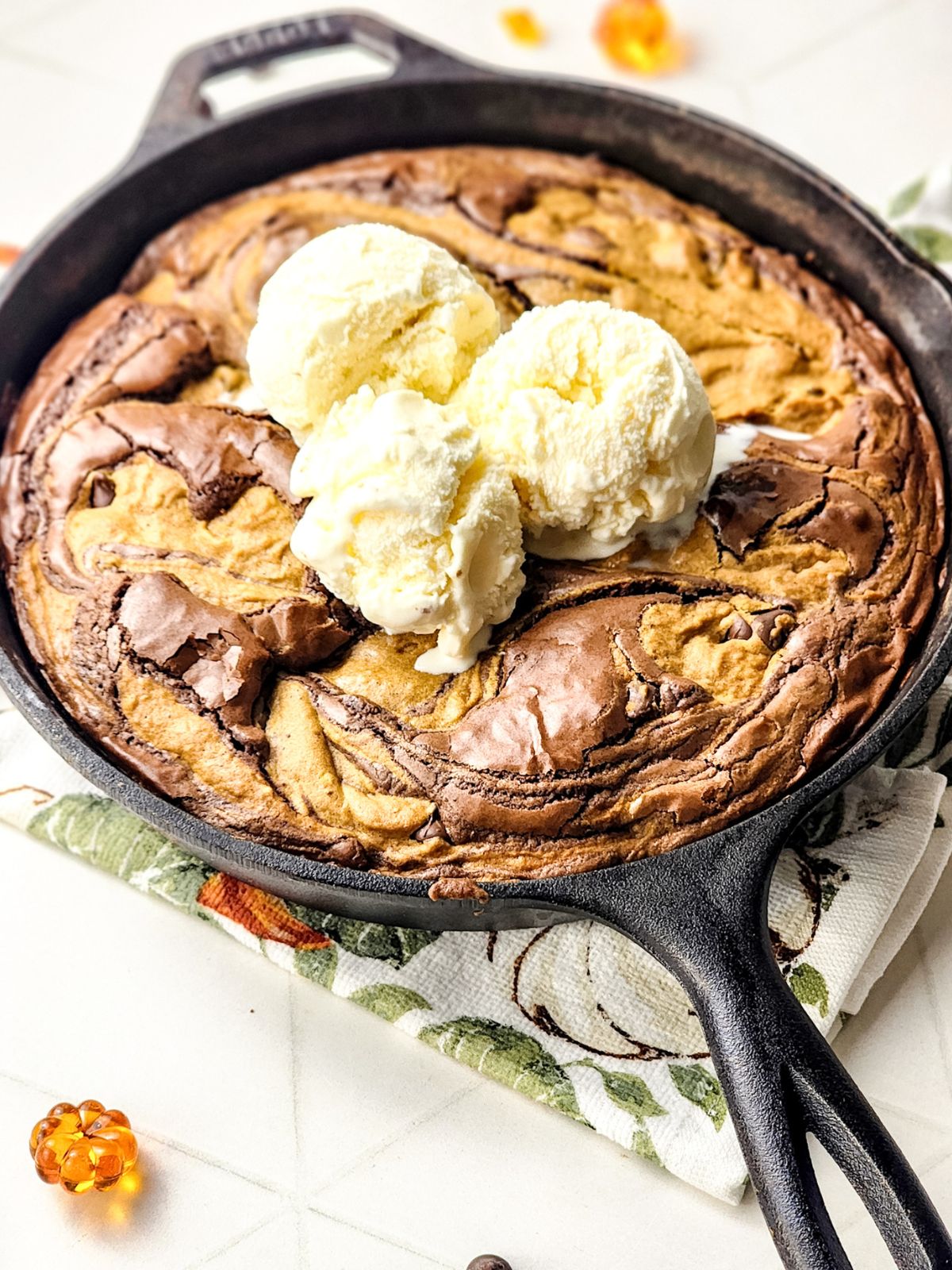 Skillet Brownies and Pumpkin Chocolate Chip Cookies swirled together and topped with ice cream.