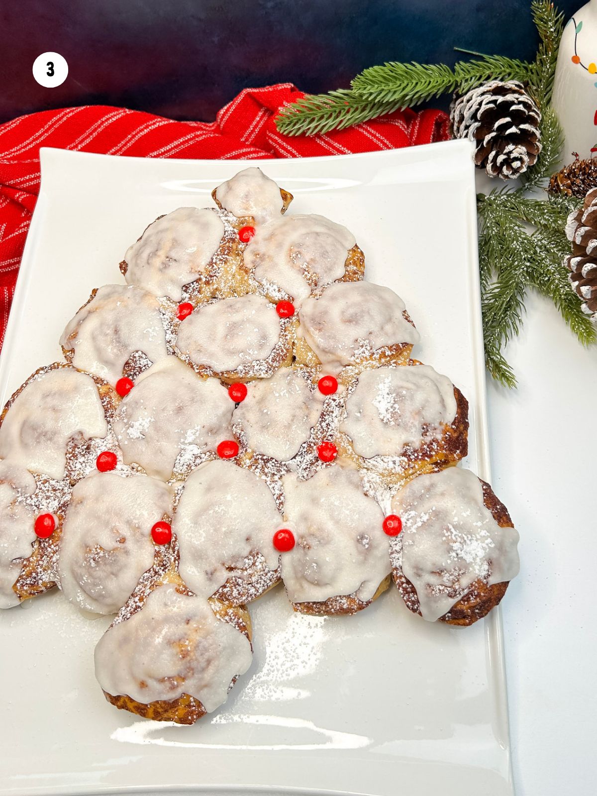frosted and decorated cinnamon roll tree.