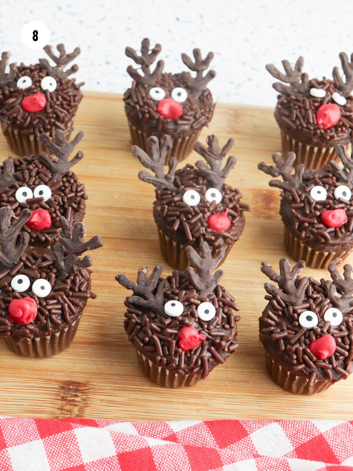 Red noses added below the eyes.