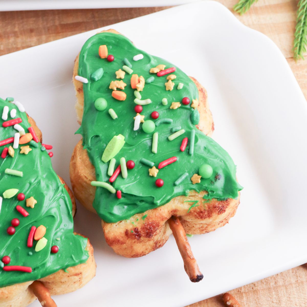 Christmas Tree Cinnamon Rolls on a Pretzel Stick.