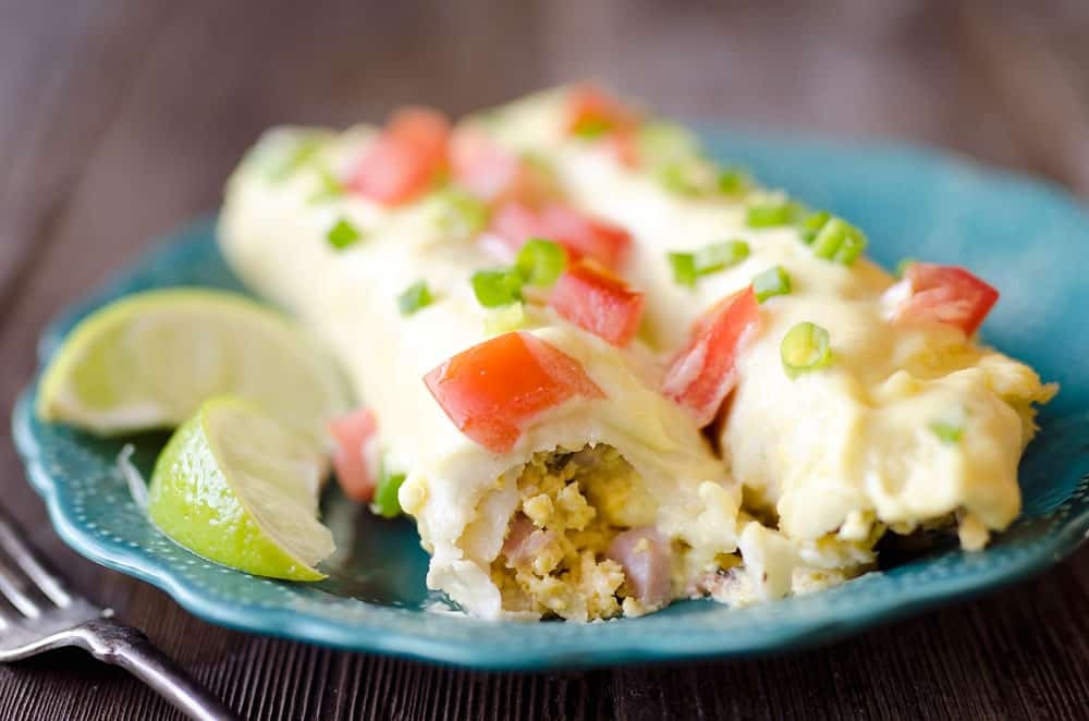 Cheesy Eggs Benedict Breakfast Enchiladas