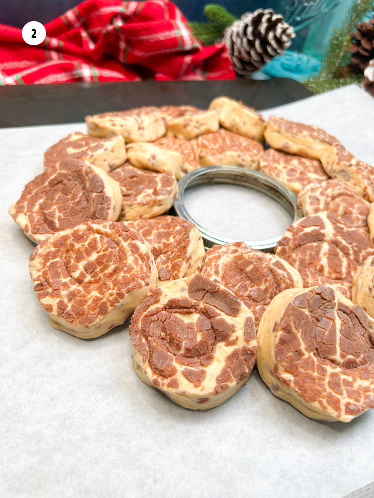refrigerated cinnamon rolls layered into a circle before baking.