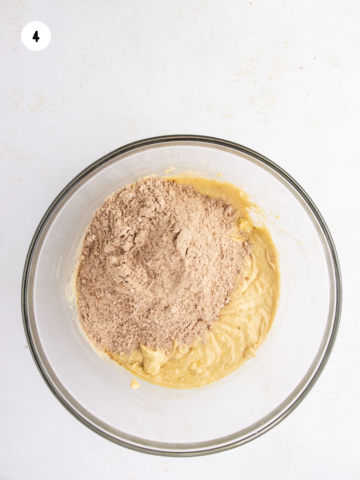 Dry ingredients added on top of the wet ingredients.