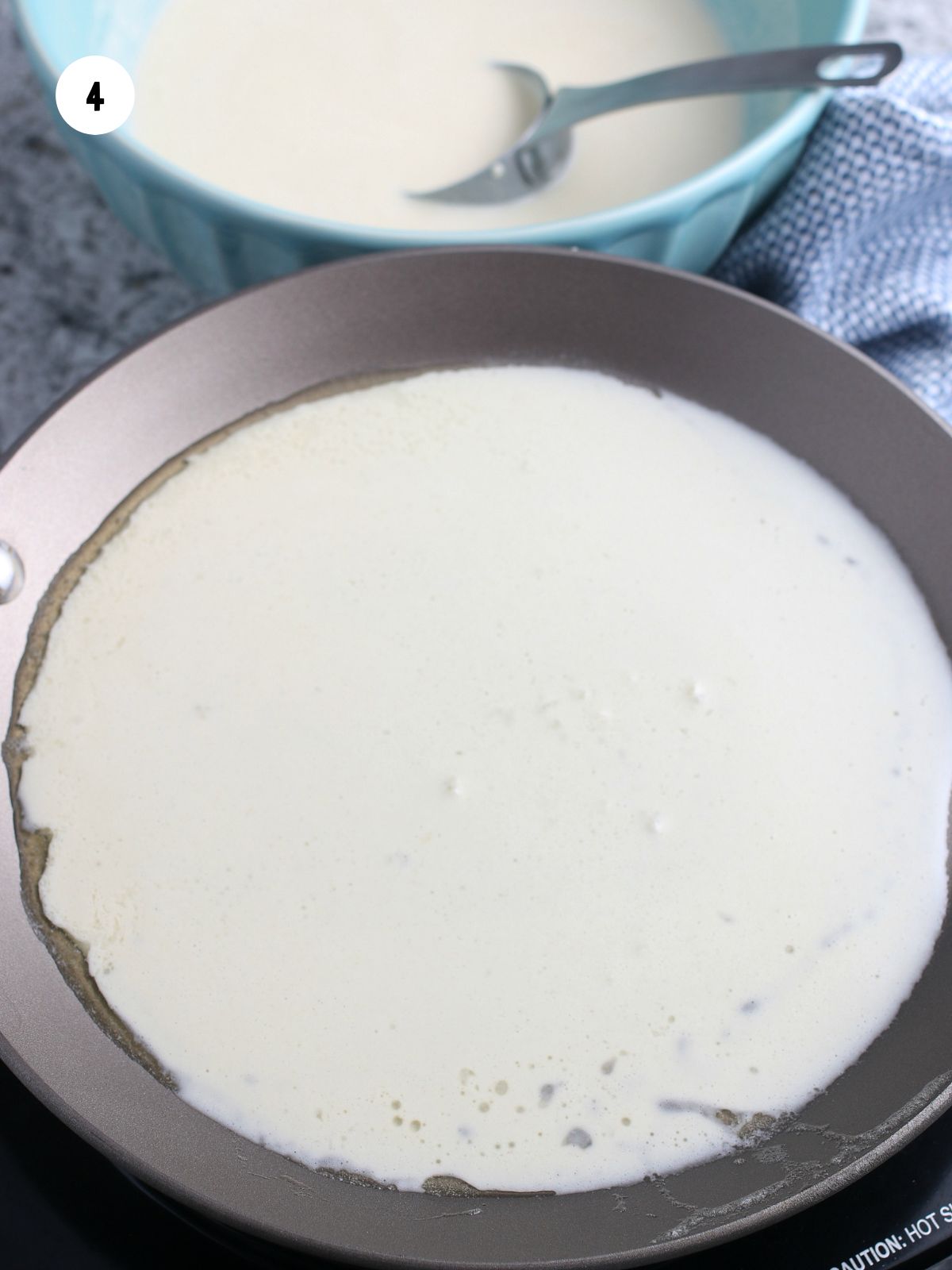 Crepe batter in pan.