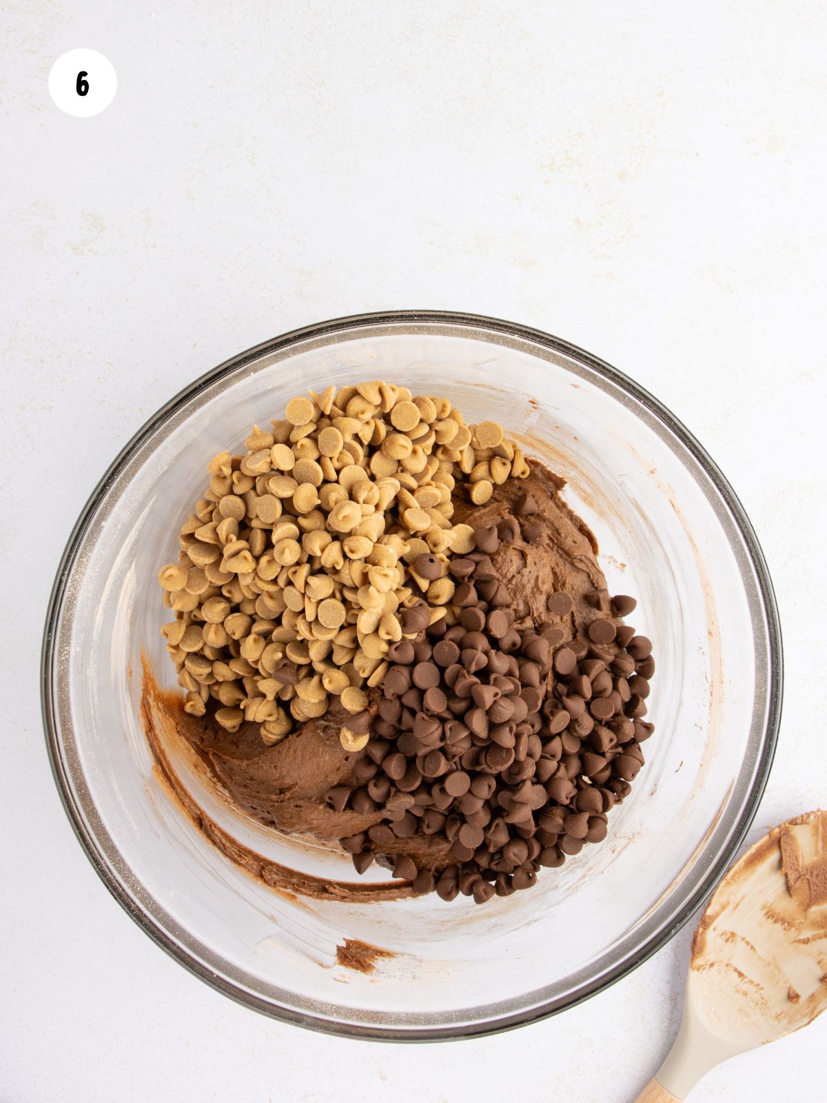 Peanut butter chips and chocolate chips added to the cookie batter.