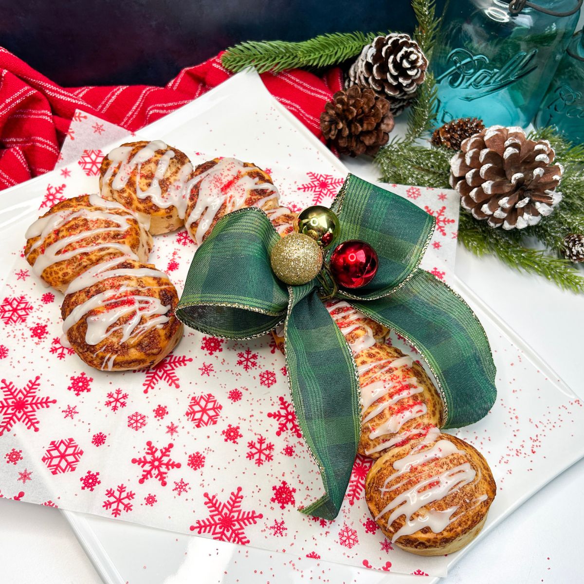 PIllsbury cinnamon rolls shaped into a candy cane for Christmas morning breakfast.