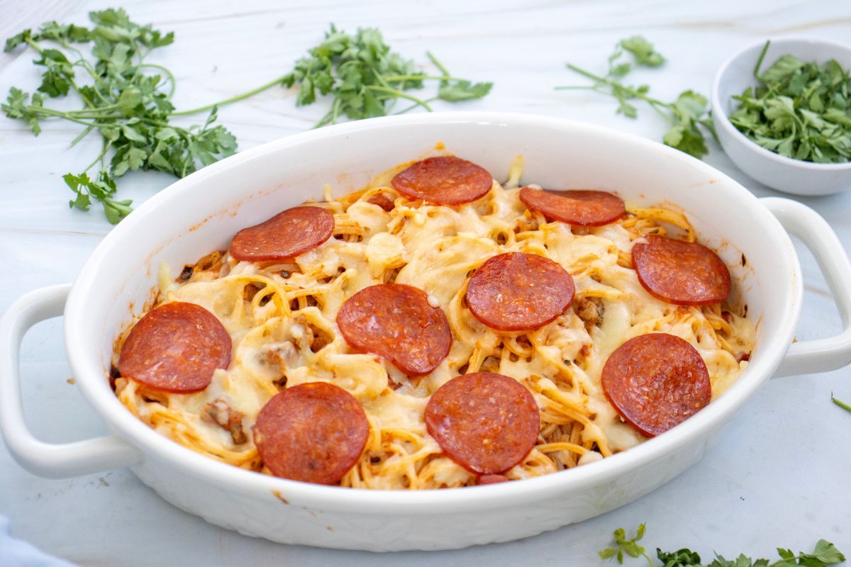 Spaghetti Pizza Casserole in an oval casserole dish.