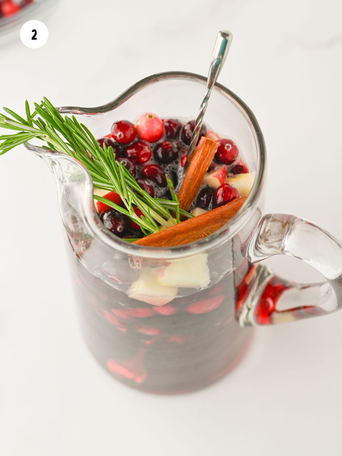 Cranberry juice filled halfway up the pitcher.