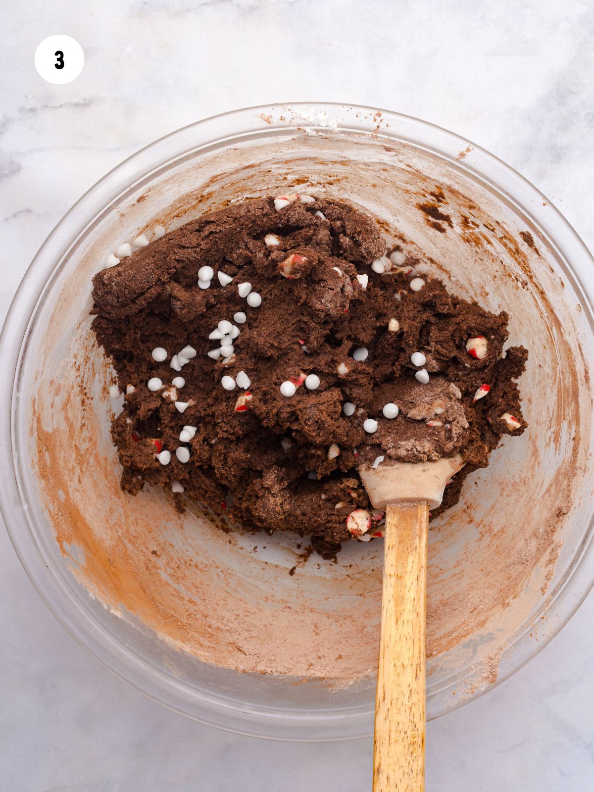 Chocolate Peppermint Cookie dough and spatula in mixing bowl.