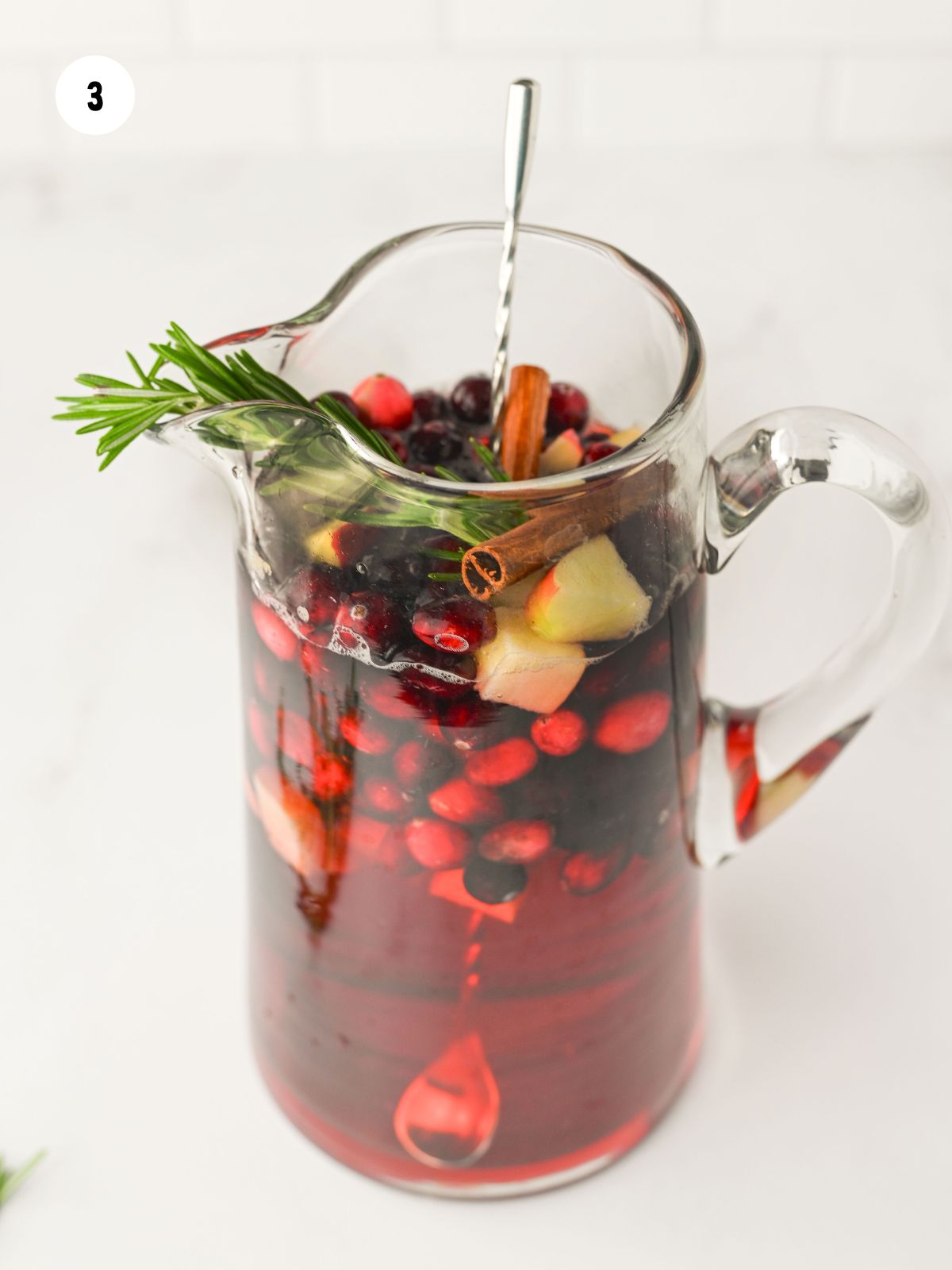 Pitcher filled the rest of the way with sparkling apple cider.