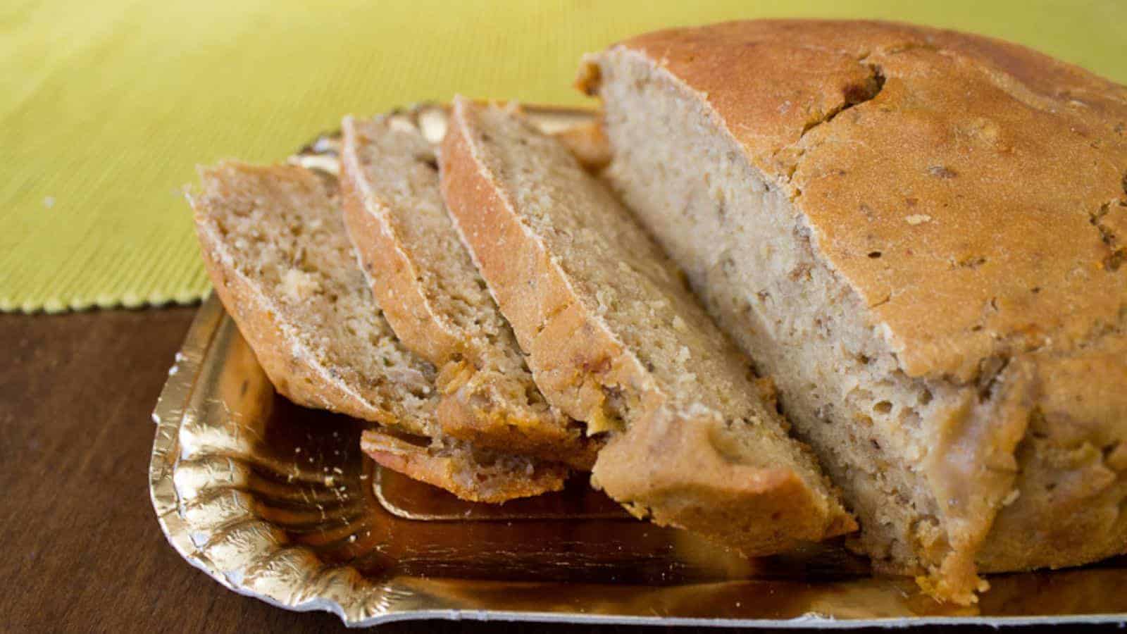 Spiced beer bread with a golden crust and soft, hearty interior.