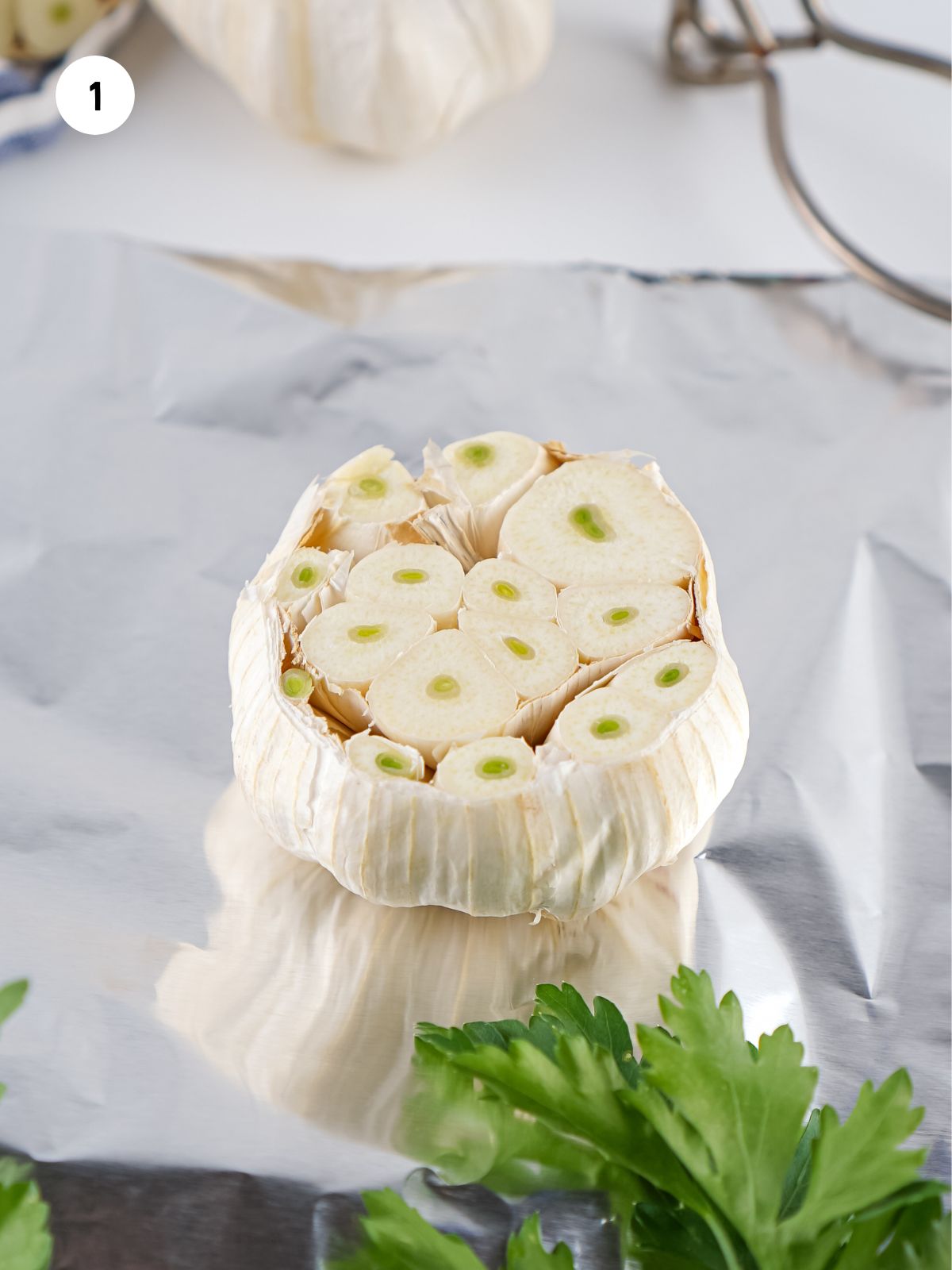 Head of garlic cut in half.