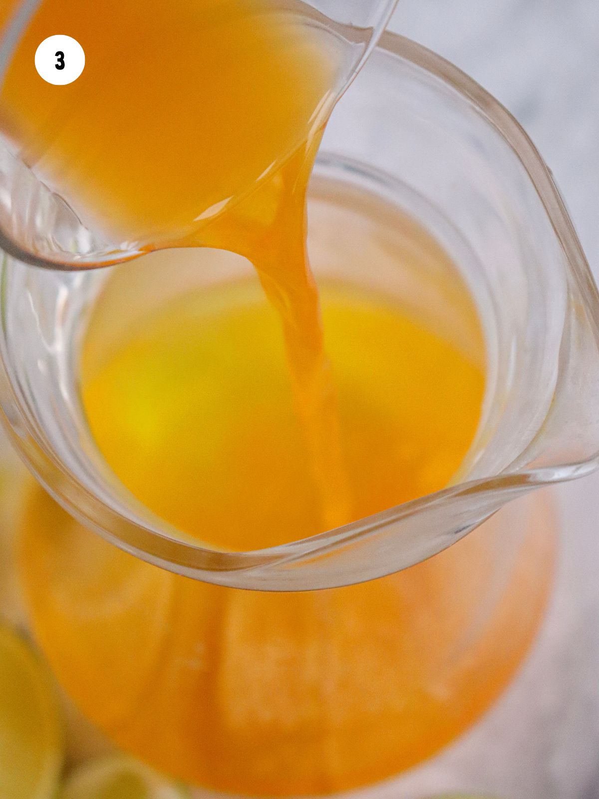 Pour in orange juice.