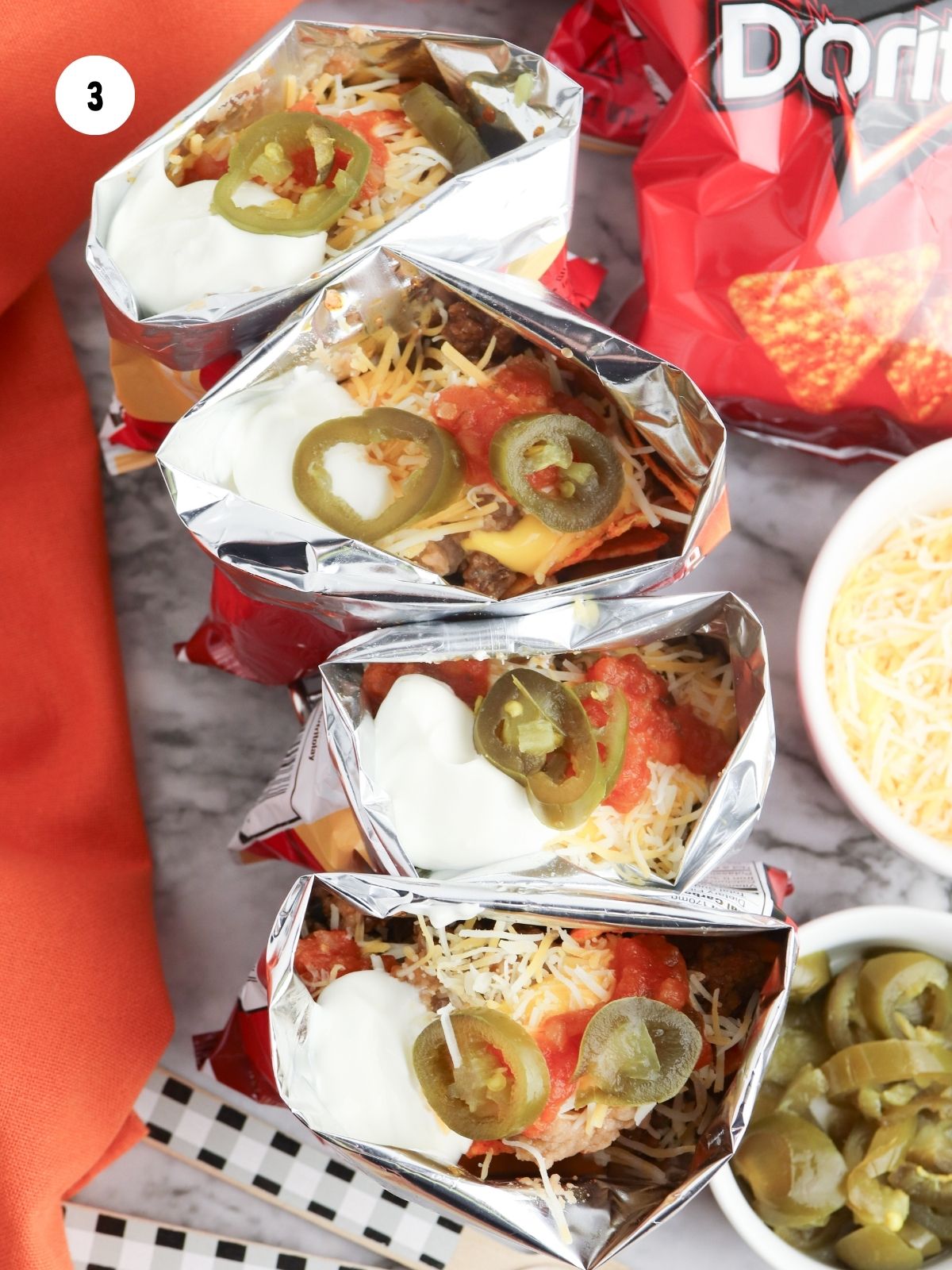 Sour cream, salsa, and jalapenos added on top.