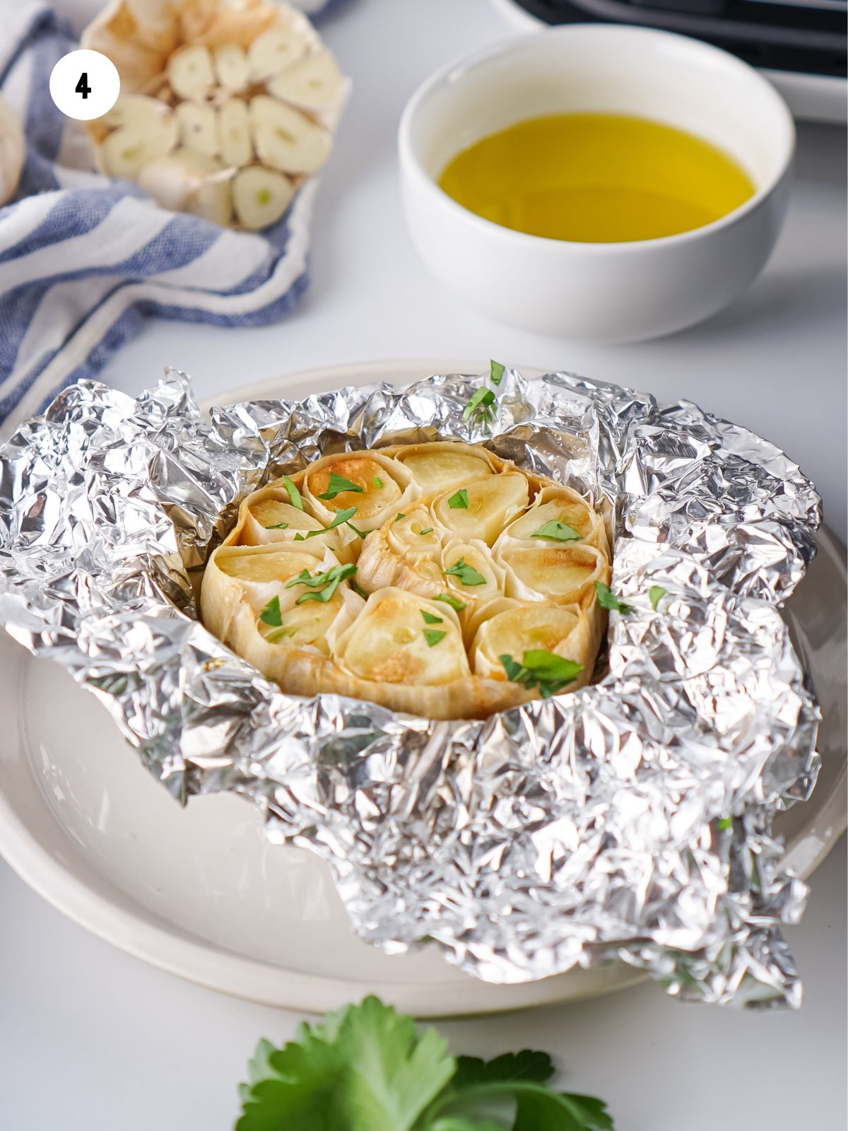 Opened foil showing roasted garlic.