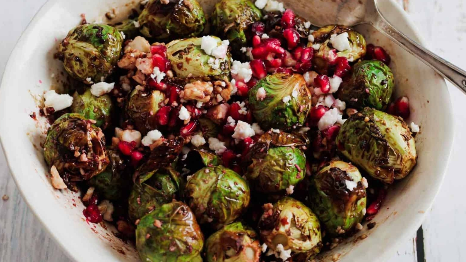 Roasted brussels sprouts with pomegranate and goat cheese.