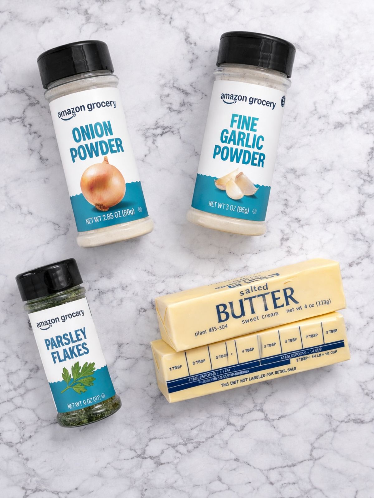 3 bottles of dried spices and 2 sticks of butter.