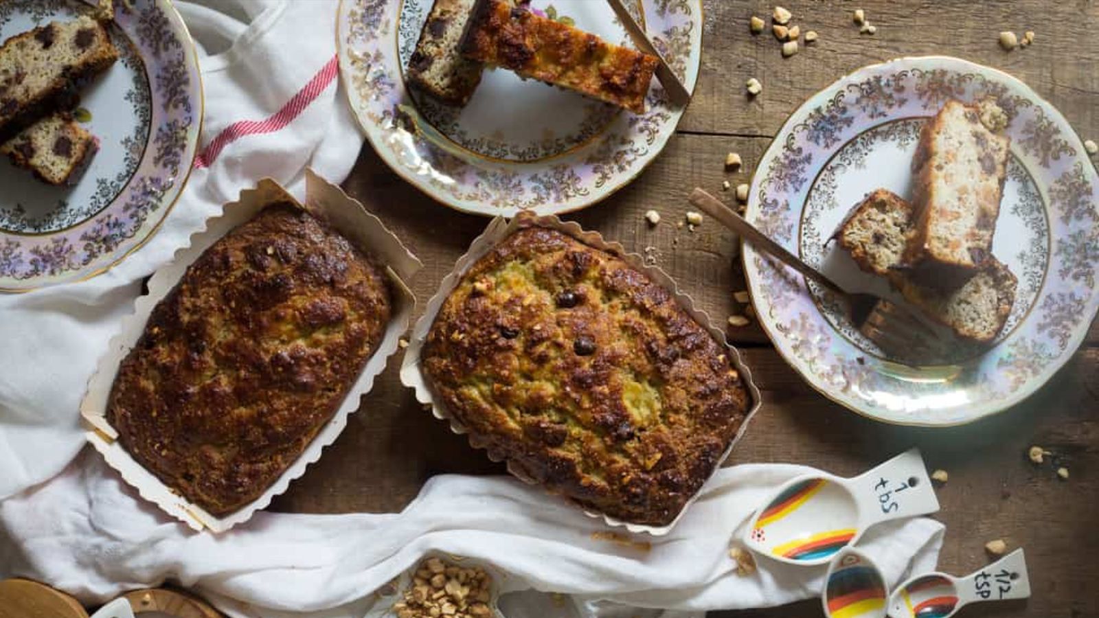 Two loaves of banana bread on a baking tray.