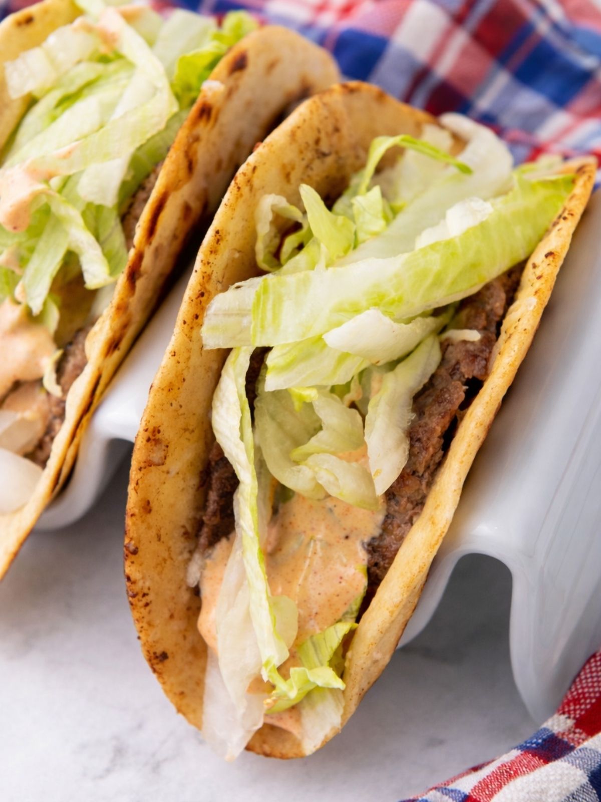 Close up of the completed smash burger taco.