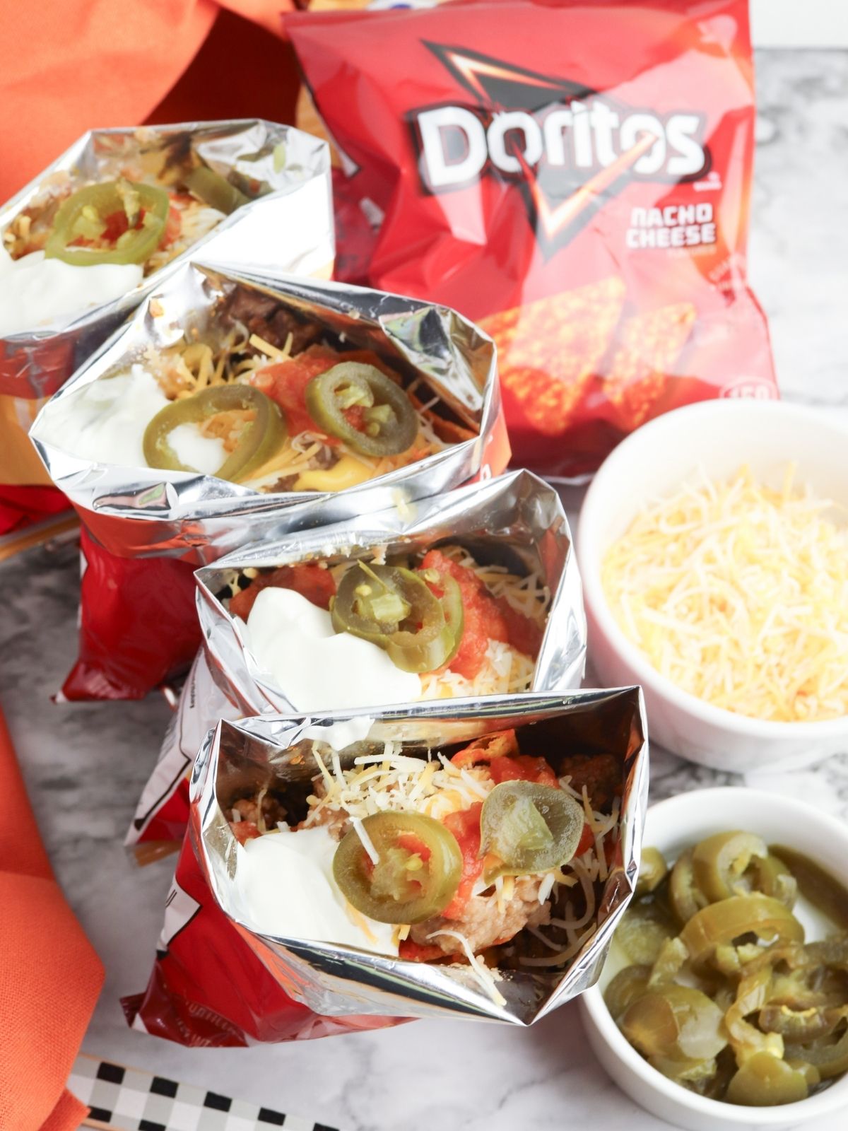 Individual bags of Doritos and Fritos made into walking tacos.